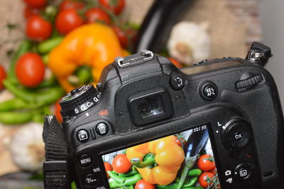 Close-up of camera on table