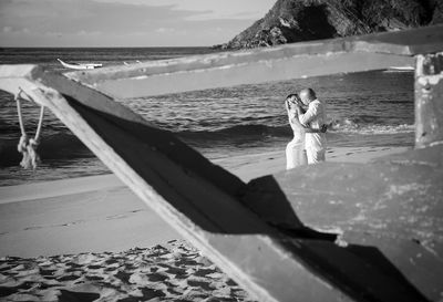 Woman standing on beach