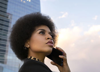 Portrait of young woman looking away