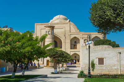 View of historical building against clear blue sky