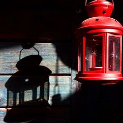 Close-up of red light against wall