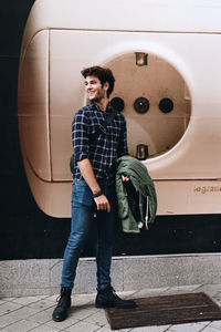 Rear view of man standing on street