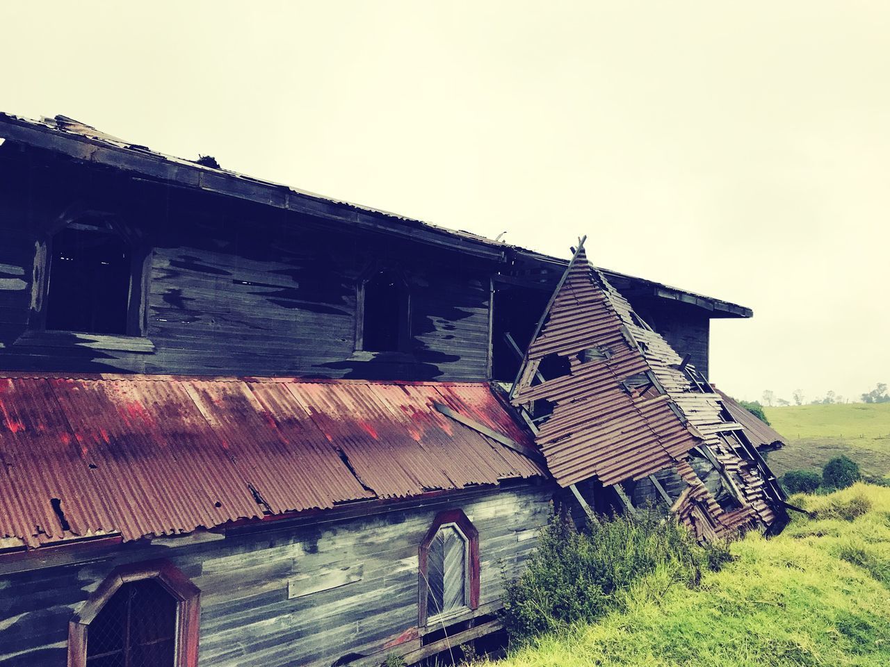 ABANDONED HOUSE AGAINST SKY