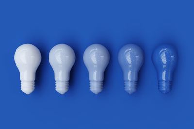 Light bulbs on blue background