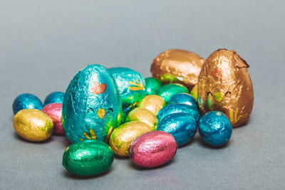 Close-up of multi colored eggs on table