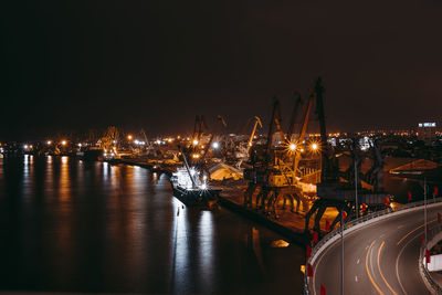 The lights from hai phong port in the night seen from the hoang van thu bridge