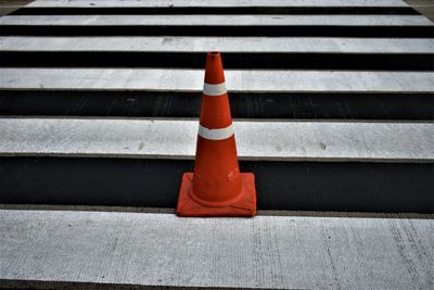 High angle view of red flag on road