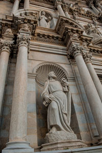 Low angle view of statue of historic building