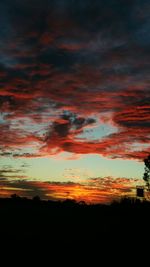 Scenic view of silhouette landscape against sky during sunset