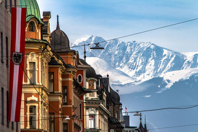 Buildings against sky during winter