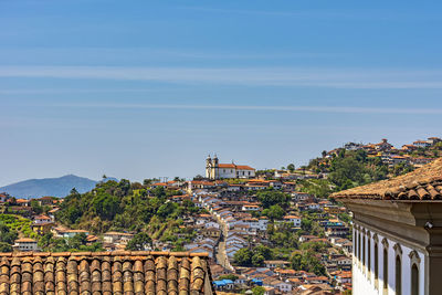 View of the houses, roofs, hills and churches of the historic city of ouro preto in minas gerais