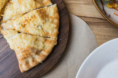 High angle view of bread in plate on table