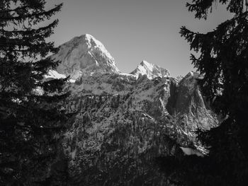 Scenic view of snowcapped mountains against clear sky