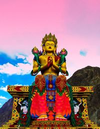 Statue of temple against sky