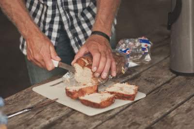 Cropped hand holding meat