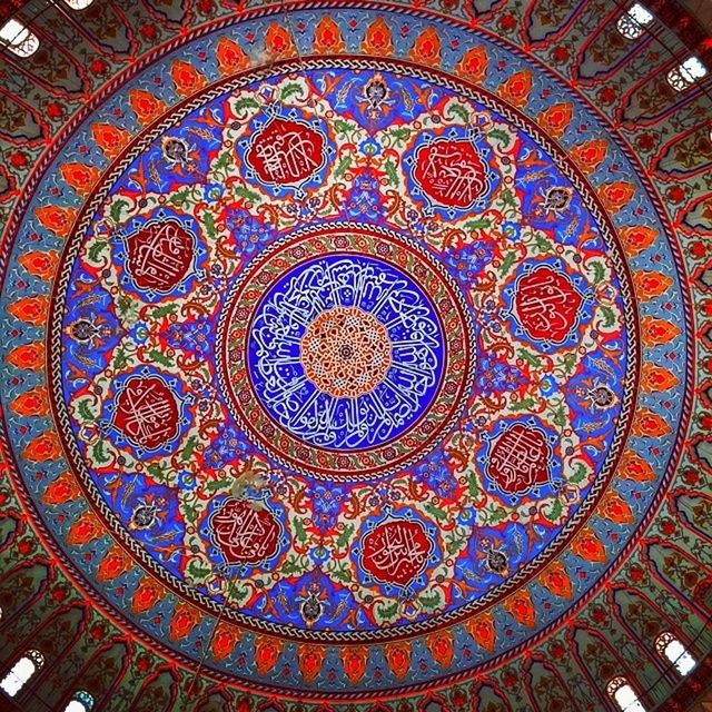 indoors, ceiling, design, pattern, ornate, architecture, art and craft, architectural feature, art, built structure, full frame, creativity, low angle view, place of worship, religion, circle, backgrounds, spirituality, decoration, floral pattern