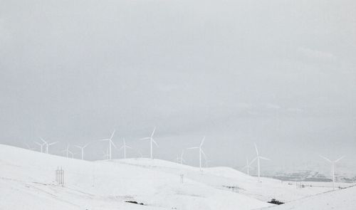 Scenic view of snow covered landscape against sky