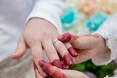 Close-up of woman holding hands