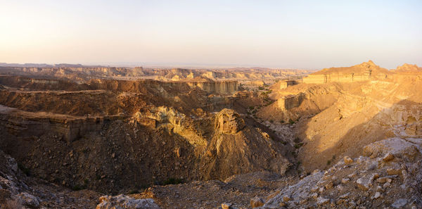 Table-top or flat top mountains in chabahar at sunset, baluchistan province. deep valleys in iran. 