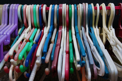 Close-up of colorful coat hangers