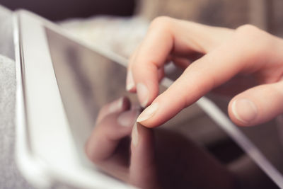 Close-up of man using mobile phone