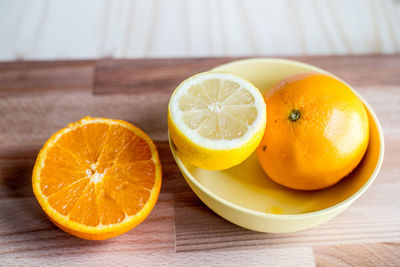 Close-up of orange fruits on table