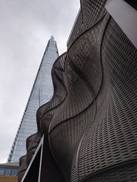 Low angle view of modern building against sky