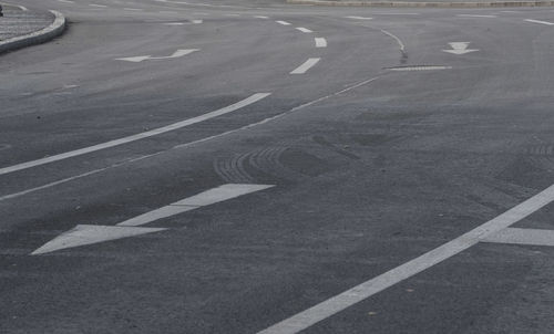 High angle view of arrow symbol on road