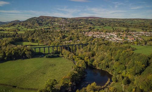 Scenic view of bridge over river against sky