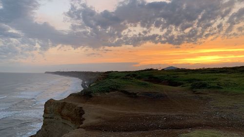 Scenic view of sea against sky during sunset