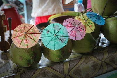 Close-up of coconut drinks in row