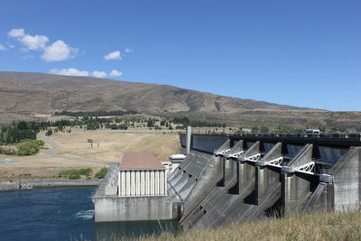 Scenic view of dam against sky