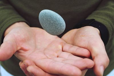 Close-up of man holding hands