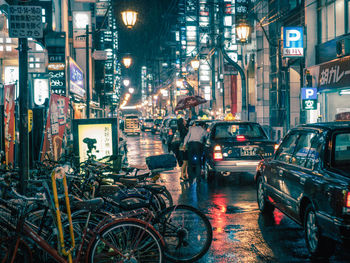 Bicycles on street in city at night