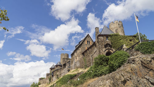 Low angle view of old ruins against sky