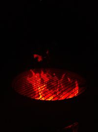 Close-up of illuminated fire in the dark