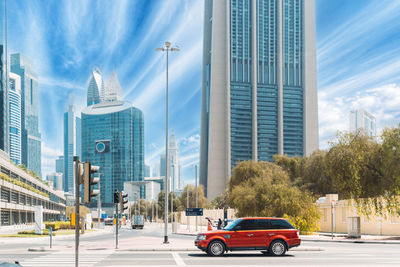 Cars on road in city