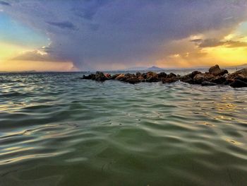 Scenic view of sea at sunset