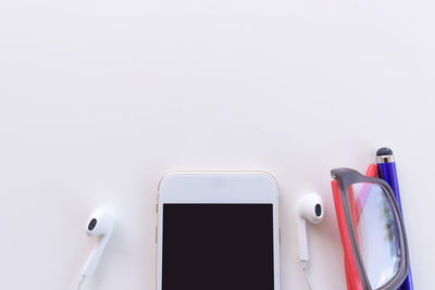 High angle view of mobile phone on table