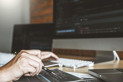 Man using laptop on table