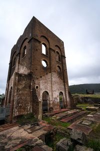 Low angle view of old building against sky