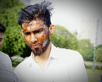 Portrait of young man looking away