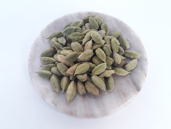 High angle view of blueberries in white background