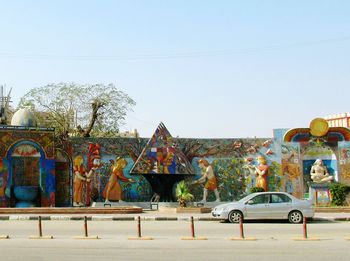 Panoramic shot of amusement park against clear sky