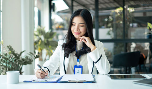 Businesswoman working at creative office