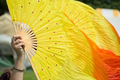 Close-up of woman holding leaf