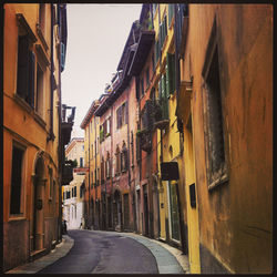 Narrow alley amidst buildings