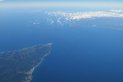 Aerial view of sea and mountains