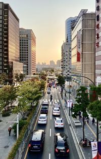 High angle view of traffic on city street and buildings