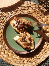 High angle view of meat in basket on table